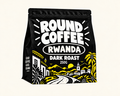Round Coffee Rwanda Dark Roast black bag with solid white logo and Good Coffee Goes Round side